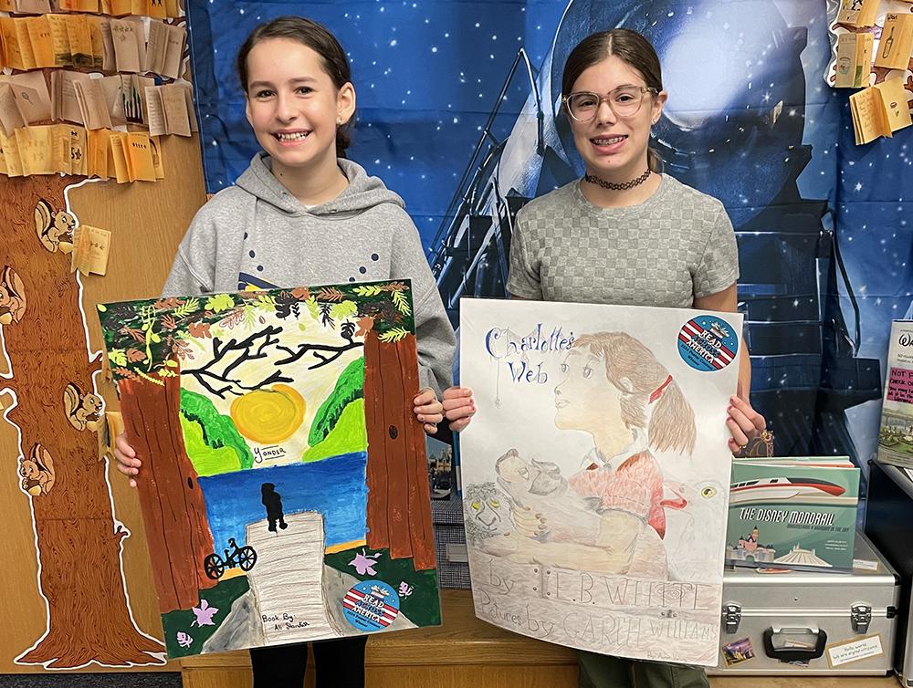 Mars Area Centennial  School students (from left) Maddie Garraux, Aivree Vierling and (not pictured) Gwen Jones were named winners of the school’s Read Across America Poster Contest.